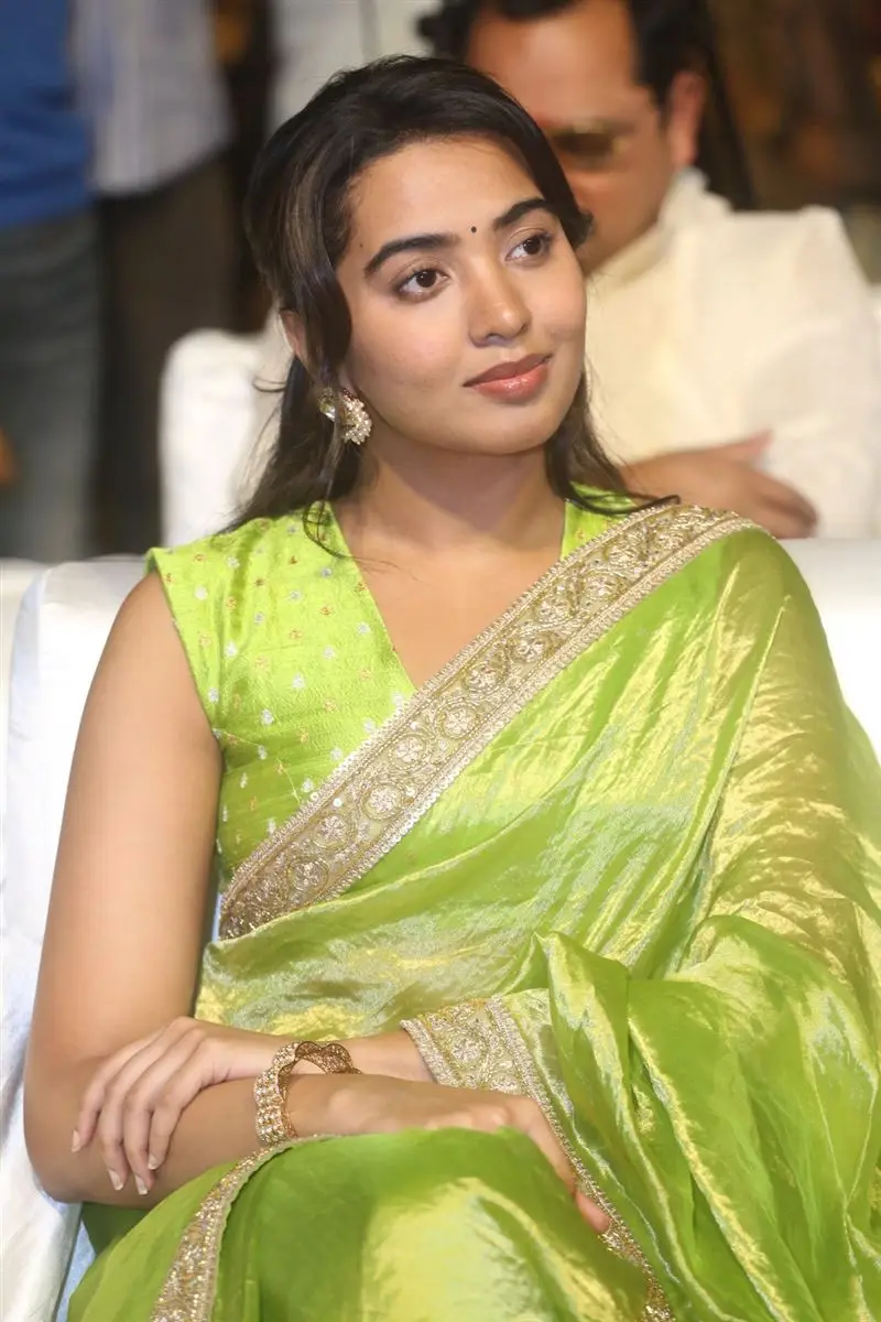 Shivathmika Rajashekar in Green Saree Sleeveless Blouse